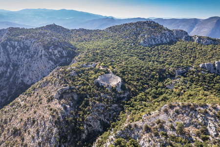 The roman theater in the ruins of the city of termessos in the mountains near antalya near the mediterranean coast of anatolia- termessos, antalya, turkeyの写真素材