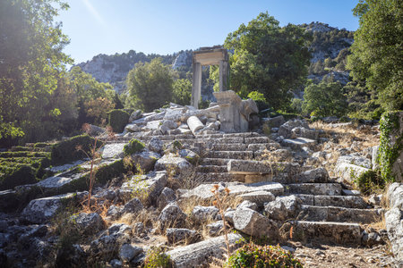 The roman theater in the ruins of the city of termessos in the mountains near antalya near the mediterranean coast of anatolia- termessos, antalya, turkeyの写真素材