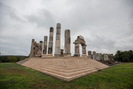 The restoration of The temple of Apollon Smintheion, in Gulpinar, Ayvacik, Canakkale, Turkey. View of the main part of the temple from the upper stage of the entrance. It stands since 200-300 BC.の写真素材