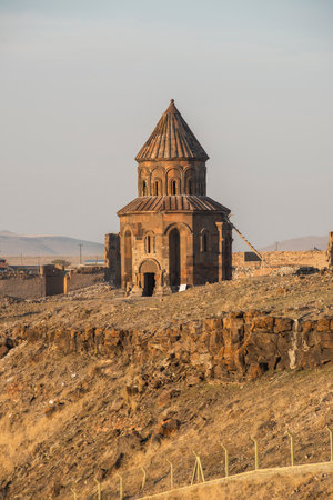 Ani ruins, Ani ancient city, historic abandoned structure with mountain background, Ani Ruins in Turkishの写真素材