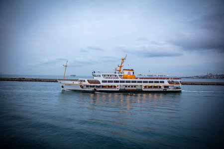 Kadikoy area in Istanbul, Turkey, a cityscape of Istanbul Kadikoy port area with ferry on Bosphorus, the strait of Istanbul.の写真素材