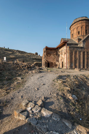 Ani ruins, Ani ancient city, historic abandoned structure with mountain background, Ani Ruins in Turkishの写真素材