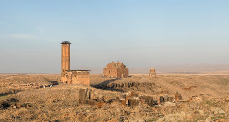 Ani ruins, Ani ancient city, historic abandoned structure with mountain background, Ani Ruins in...