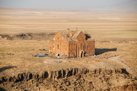 Ani ruins, Ani ancient city, historic abandoned structure with mountain background, Ani Ruins in Turkishの写真素材