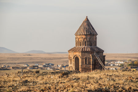 Ani ruins, Ani ancient city, historic abandoned structure with mountain background, Ani Ruins in Turkishの写真素材