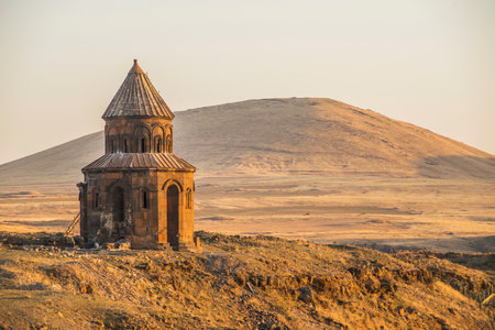 Ani ruins, Ani ancient city, historic abandoned structure with mountain background, Ani Ruins in Turkishの写真素材