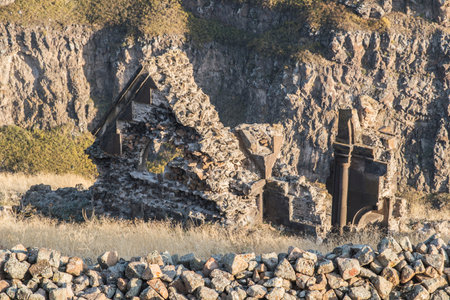 Ani ruins, Ani ancient city, historic abandoned structure with mountain background, Ani Ruins in...