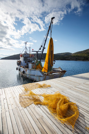 Fishing boat on the pier. Croatia, Dalmatia.の写真素材