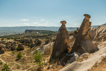 View of Uchisar Castle valley, Ancient town Anatolia amazing landscape, Travel of Turkey Goreme Cappadocia Turkiye, popular tourist destination world heritage unesco.の写真素材