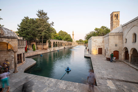 Balikligol (The Fish Lake) in Sanliurfa, Turkey. Panorama of the Pool of Abraham or Pool of Sacred...