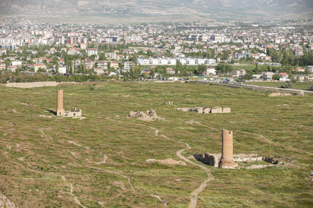 Ancient Van Castle in Turkey, also known as Tushba Castle (Van Castle) with the background of panoramic view of Van City and snowy Erek Mountain.の写真素材