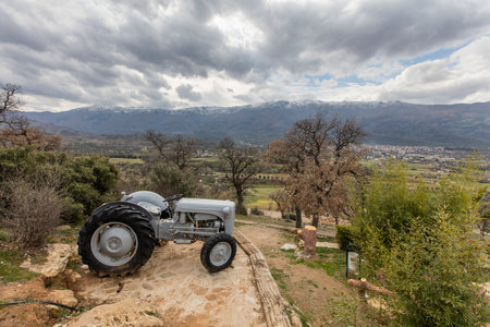 Tractor on the top of the hill in the village of Castellon, Spainの写真素材
