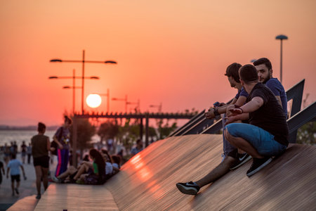 People doing sports in the morning on the Bostanli shore. Bostanli is a neighborhood of Karsiyaka province of Izmirの写真素材