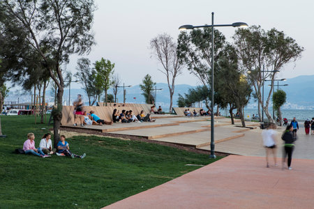 People doing sports in the morning on the Bostanli shore. Bostanli is a neighborhood of Karsiyaka province of Izmirの写真素材