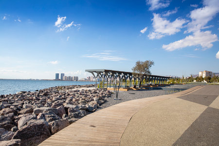 People doing sports in the morning on the Bostanli shore. Bostanli is a neighborhood of Karsiyaka province of Izmirの写真素材