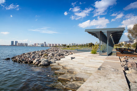 People doing sports in the morning on the Bostanli shore. Bostanli is a neighborhood of Karsiyaka province of Izmirの写真素材