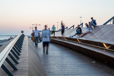 People doing sports in the morning on the Bostanli shore. Bostanli is a neighborhood of Karsiyaka province of Izmirの写真素材
