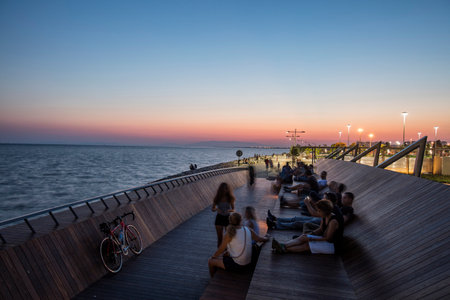People doing sports in the morning on the Bostanli shore. Bostanli is a neighborhood of Karsiyaka province of Izmirの写真素材