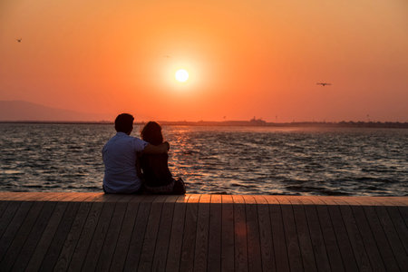 People doing sports in the morning on the Bostanli shore. Bostanli is a neighborhood of Karsiyaka province of Izmirの写真素材