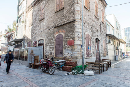 People on the street in Kemeralti district. Kemeralti (Kemeralti Carsisi) is a historical market (bazaar) district of Konak. Izmir, Turkeyの写真素材