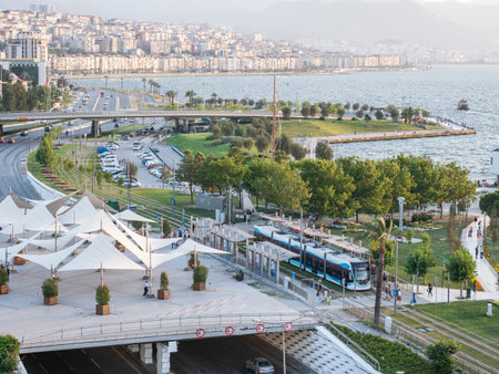 Konak Square street view with old clock tower (Clock Tower) at sunset. It was built in 1901 and accepted as the official symbol of Izmir City, Turkey.の写真素材
