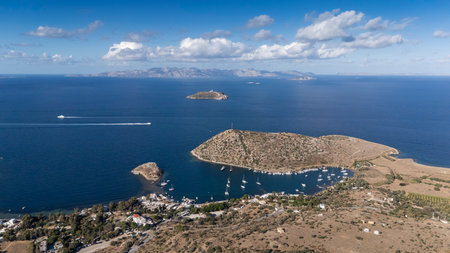 Breathtaking View of GÃ¼mÃ¼ÅlÃ¼k Bay with Yachts and Nearby Greek Islandsの写真素材