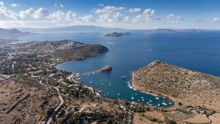 Breathtaking View of GÃ¼mÃ¼ÅlÃ¼k Bay with Yachts and Nearby Greek Islandsの写真素材