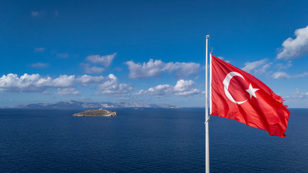 Turkish Flag Flying Over Kardak Rocks in Bodrum, Aegean Seaの写真素材