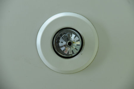 Sprinkler Head, Indoor Fire fighting equipment, on white ceiling. View from the bottom