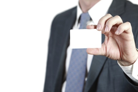 Businessman holding an empty business card  Isolated on white   の写真素材