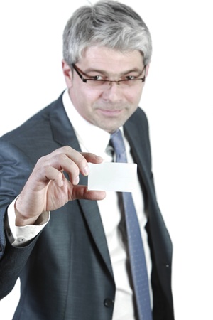 Businessman holding an empty business card  Isolated on white   の写真素材
