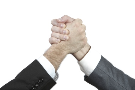 Two businessman shaking hands as a result of a good deal successful investment   の写真素材