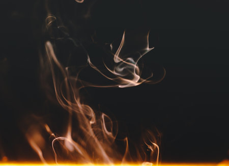 Abstract figures of smoke in darkの写真素材