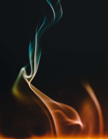 Abstract figures of smoke in darkの写真素材