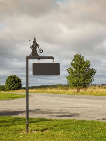 an ornamental house sign in a rural settingの写真素材