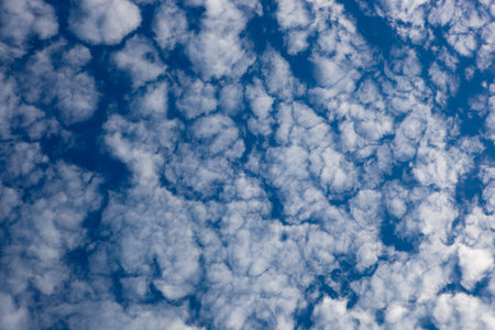 a blue and white sky and cloud background