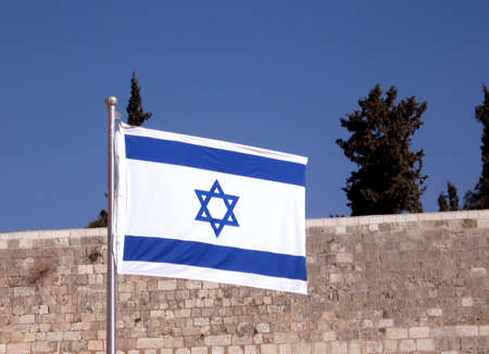 The Jewish flag fluttering on the Jerusalem,Israelの写真素材