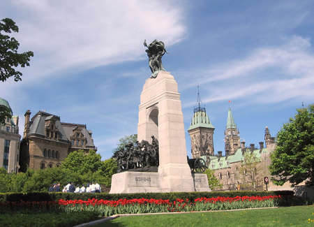 National war memorial on the background of Canadian Parliament in Ottawa,Canadaのeditorial素材