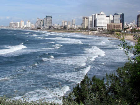  View of heavy sea and Tel Aviv in old Jaffa, Israel                                 のeditorial素材