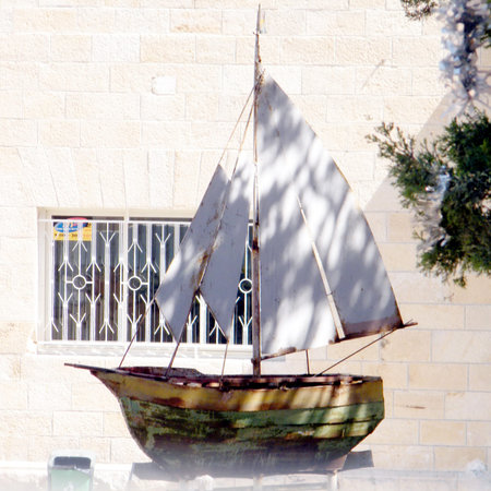 Decorative  boat on the fence in old city Jaffa, Israel   