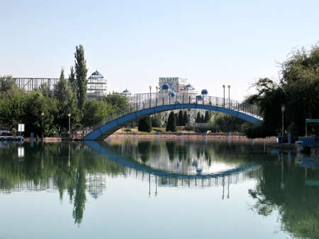 Pond and bridge in park Almazar in Tashkent, the capital of Republic Uzbekistanの写真素材