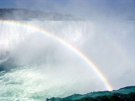 The spectacular rainbow at Niagara Falls in spring, Canadaの写真素材
