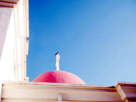 Dove on the cross of greek orthodox monastery in Kapernaum, Israelの写真素材