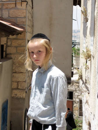 Jewish boy on a street in old city Safed, Israel, June 29, 2008のeditorial素材