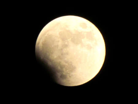 The beginning of the lunar eclipse in Or Yehuda, Israel, June 15, 2011の写真素材