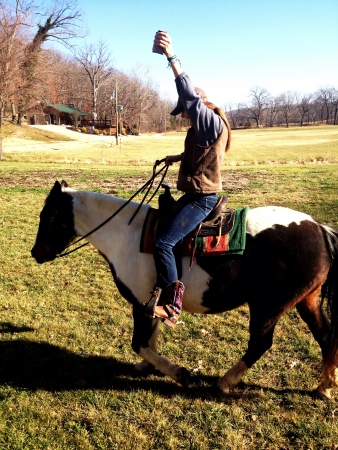 Girl riding a horseの素材