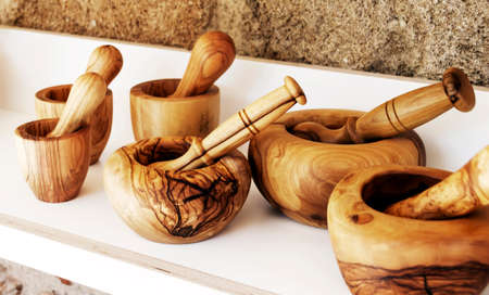 Different sized wooden mortar and pestle setsの写真素材