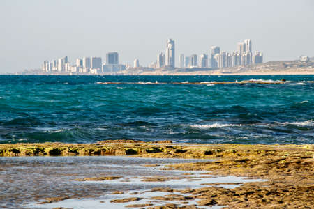 View of the modern city from the sea sideの写真素材