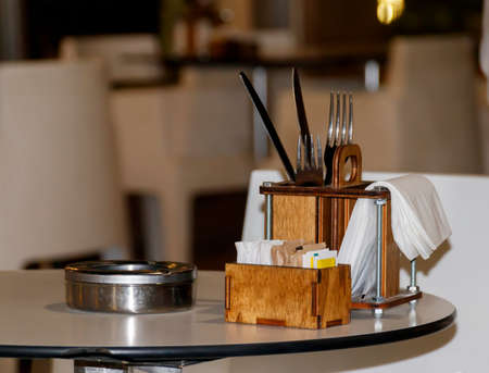Table set and ashtray on the tableの写真素材