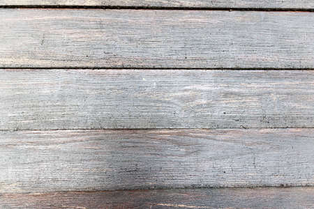 Wall of old cracked wooden boardsの写真素材